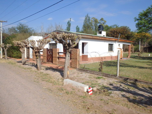 A nice home with recently trimmed trees.